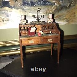 A Fine Miniature Dolls House Secretaire And Fine Artisans Miniatures