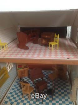 Antique dollhouse By FAO Schwarz in the 50's to the 60's. Big Size 38 X 22