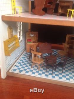 Antique dollhouse By FAO Schwarz in the 50's to the 60's. Big Size 38 X 22