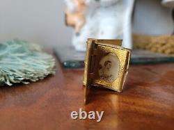 Antique miniature dolls house gilt picture frame and gilt photo album