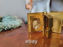 Antique miniature dolls house gilt picture frame and gilt photo album