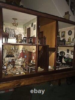 Antique miniature masterpiece, A Fine 1797 Baby House With Contents