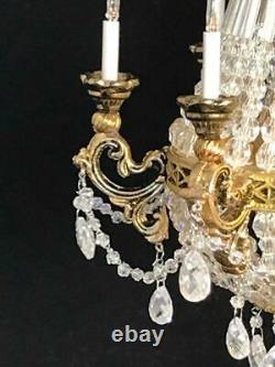 Artiasn made by Frank Crescente 6 arm Empire brass and crystal chandelier