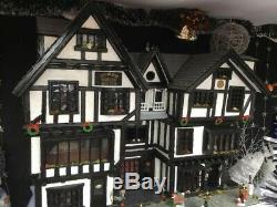 Beautiful Tudor style 8 rooms dolls house