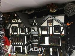 Beautiful Tudor style 8 rooms dolls house