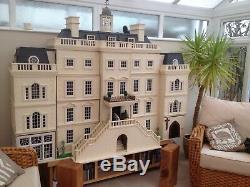 Beautiful dolls house. Fully furnished with figures and can be dismantled