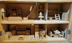 Classic four storey wooden dolls house with all furniture