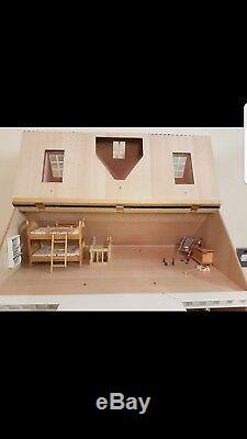 Dolls House with furniture and accessories