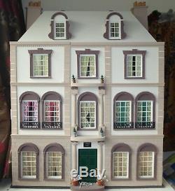 Dolls house 1/12th scale with loads of furniture and dolls