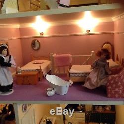 Dolls house, fully decorated and lit with full furnishings