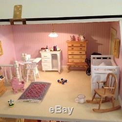 Dolls house, fully decorated and lit with full furnishings
