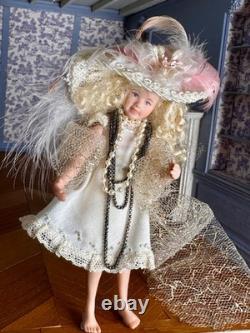 Dolls house miniature 112 ARTISAN pretty porcelain girl doll playing dress-up