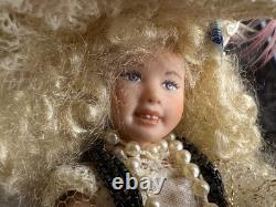 Dolls house miniature 112 ARTISAN pretty porcelain girl doll playing dress-up