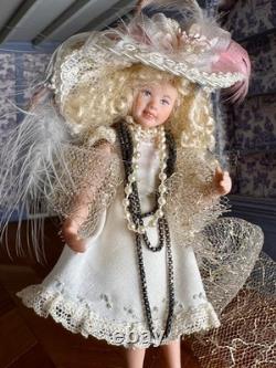 Dolls house miniature 112 ARTISAN pretty porcelain girl doll playing dress-up