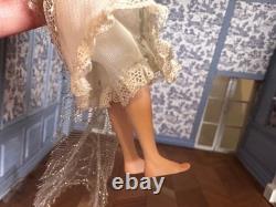 Dolls house miniature 112 ARTISAN pretty porcelain girl doll playing dress-up
