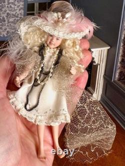 Dolls house miniature 112 ARTISAN pretty porcelain girl doll playing dress-up