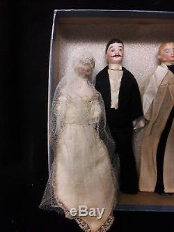 Eight Antique Bisque Doll's House Dolls, All Original Wedding Party