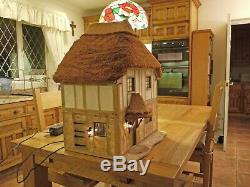 Exquisite and beautiful Hand Made Thatched Dolls House. (A Graham Wood Original)