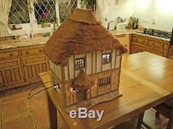 Exquisite and beautiful Hand Made Thatched Dolls House. (A Graham Wood Original)