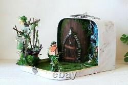 Fairy room in the suitcase. Miniature dollhouse forest diorama 112 scale swing