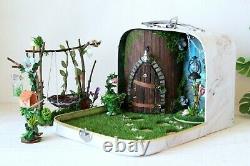 Fairy room in the suitcase. Miniature dollhouse forest diorama 112 scale swing