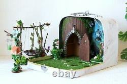 Fairy room in the suitcase. Miniature dollhouse forest diorama 112 scale swing