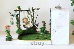 Fairy room in the suitcase. Miniature dollhouse forest diorama 112 scale swing