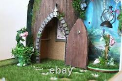 Fairy room in the suitcase. Miniature dollhouse forest diorama 112 scale swing