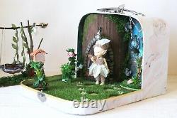 Fairy room in the suitcase. Miniature dollhouse forest diorama 112 scale swing