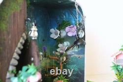 Fairy room in the suitcase. Miniature dollhouse forest diorama 112 scale swing