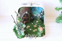 Fairy room in the suitcase. Miniature dollhouse forest diorama 112 scale swing