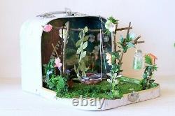 Fairy room in the suitcase. Miniature dollhouse forest diorama 112 scale swing