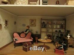 Fully furnished 3 storey dolls house with lighting kit Good condition