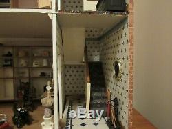 Fully furnished 3 storey dolls house with lighting kit Good condition