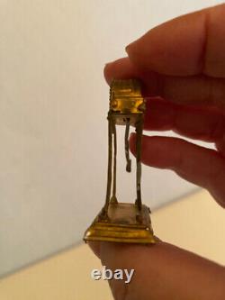 GERLACH Doll House 19thc German Miniature Gilded Metal CLOCK, pendulum moves