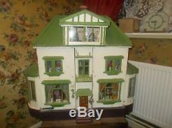 Large Vintage Dolls House with loads of items inside