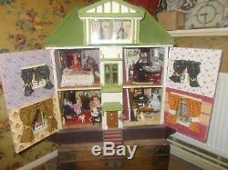 Large Vintage Dolls House with loads of items inside