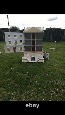 Large Wooden Dolls House With Dolls And Furniture