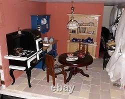Large doll house with basement and accessories Good condition