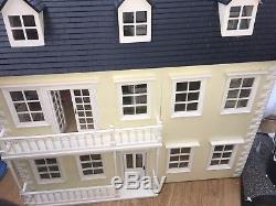 Large dolls house used, some rooms fully furnished