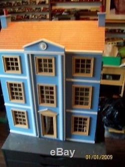 Large wooden dolls house hand made fully furnished