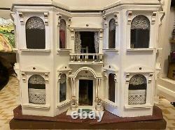 Matching pair of G & J Lines Bros fully furnished'Kits Coty' dolls houses c1910