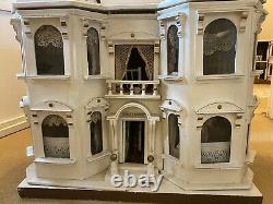 Matching pair of G & J Lines Bros fully furnished'Kits Coty' dolls houses c1910