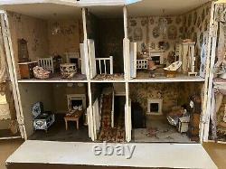 Matching pair of G & J Lines Bros fully furnished'Kits Coty' dolls houses c1910