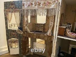 Matching pair of G & J Lines Bros fully furnished'Kits Coty' dolls houses c1910