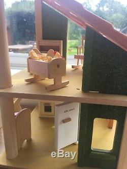 Plan toys dolls house