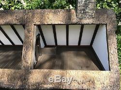 Stunning handmade, thatched country cottage dolls house