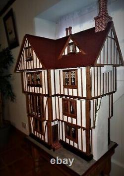 Vintage 12th large handmade Tudor Dolls House with working candle lighting